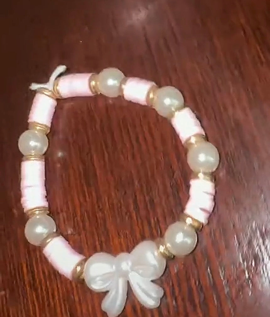 ￼Pink pearl bow